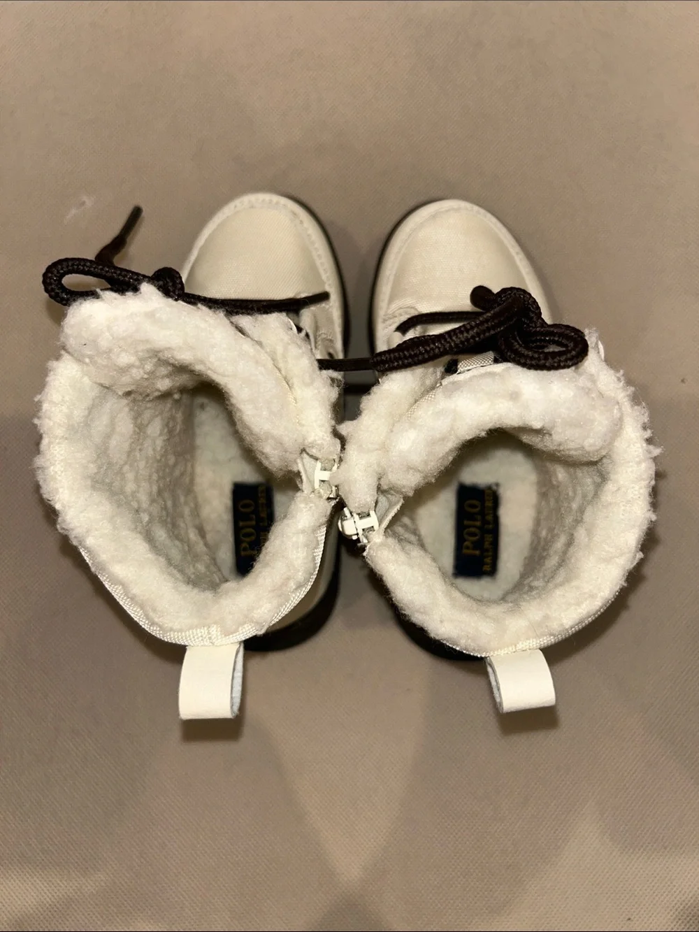Polo Ralph Lauren Girl’s snow boots featuring a white nylon upper, Size 8